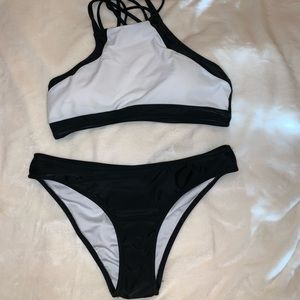 Strapped halter swim suit black and white